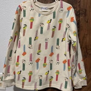 Like new. Japanese Pez sweater. Girls size large